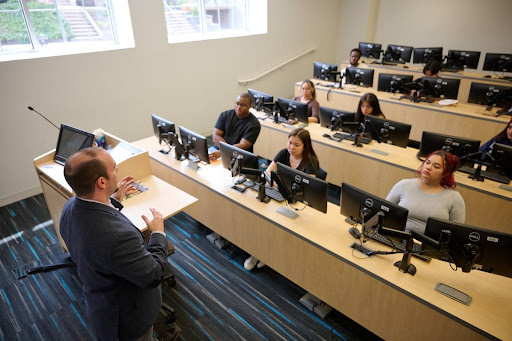 professors reviewing documents are a social gathering