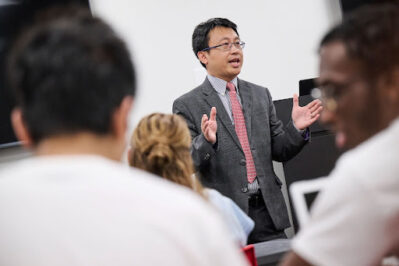 professor leading a vibrant classroom discussion