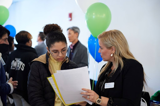 professors reviewing documents are a social gathering