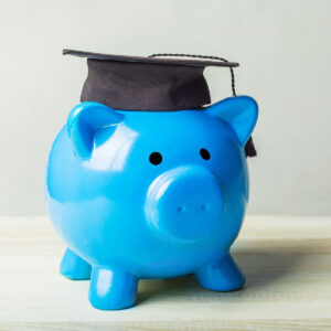 photo of piggy bank with graduation cap