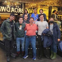 Students are pictured with Professor Adler outside The Museum of Broadway.