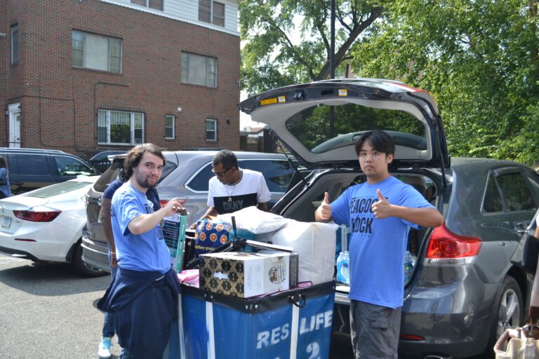 students unloading car